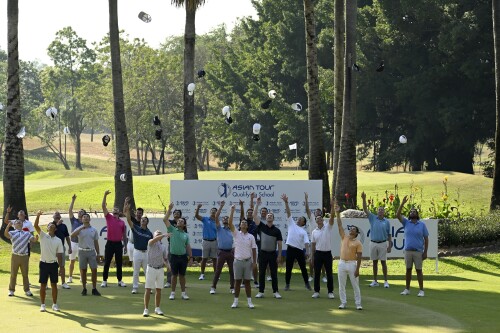 HUA HIN, THAILAND:  Asian Tour players throw thjeir hats into the air after securing their 2023 Tour cards during Round Five on Sunday, January 22 during the final stage of the 2023 Asian Tour qualifying school. The event is being held from January 18-22, 2023 at Lake View Resort & Golf Club, Hua Hin, Thailand. Picture by Paul Lakatos/Asian Tour.