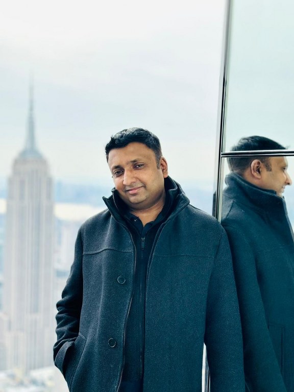 A person in a black jacket
AI-generated content may be incorrect.
