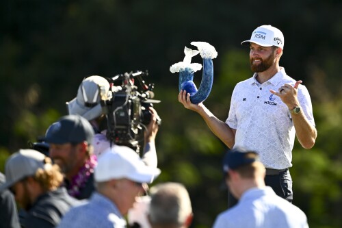KAPALUA, MAUI, HAWAII - JANUARY 07: Chris Kirk poses for photos during the trophy ceremony of The Sentry at The Plantation Course at Kapalua on January 7, 2024 in Kapalua, Maui, Hawaii. (Photo by Tracy Wilcox/PGA TOUR via Getty Images)