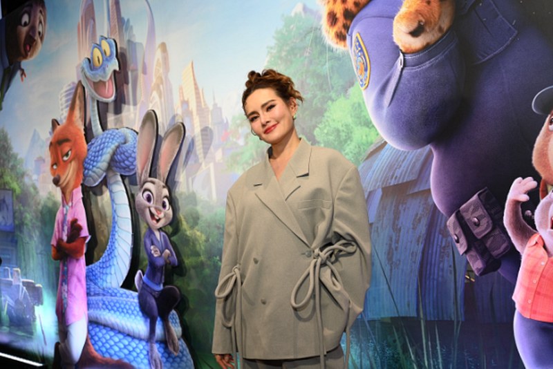 A person standing in front of a mural

AI-generated content may be incorrect.