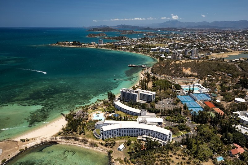 A collage of a building and a body of water

AI-generated content may be incorrect.