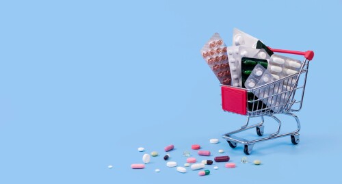 shopping-cart-with-pill-foils-copy-space_23-2148533453.jpeg